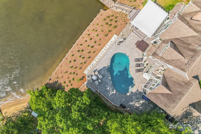Aerial view of the estate showing the replanted hillside running down to the bulkhead